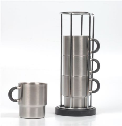 Stainless steel mugs in holder